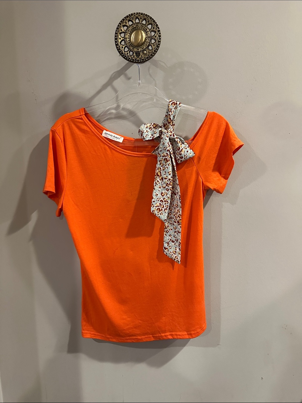 Anna-Kaci Orange Short Sleeve Top with Leopard-Print Bow